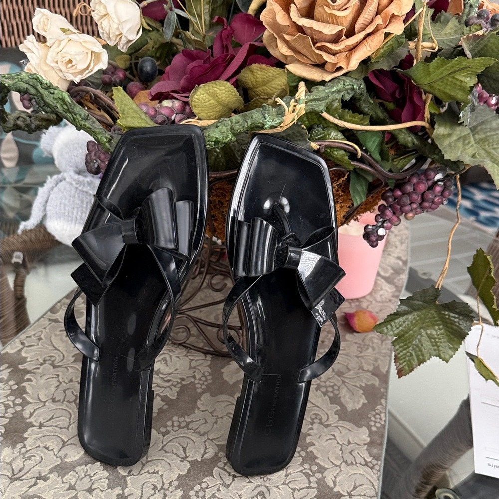 BCBGeneration Black Patent Bow Slide Sandals